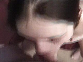 Her youthful lips nestle around his beef whistle