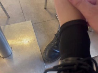Shoeplay with socks in the restaurant