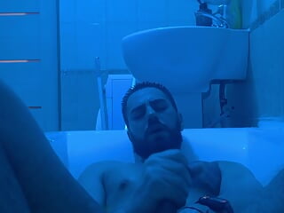 Bearded boy jacking off in the douche