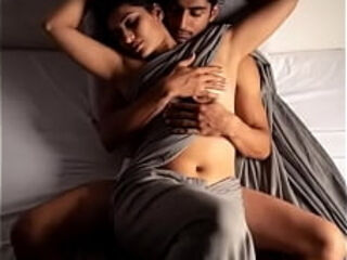 Super-hot Bhabhi smooching on Dewar on couch