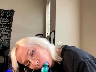 Busty babe playing with her big boobs