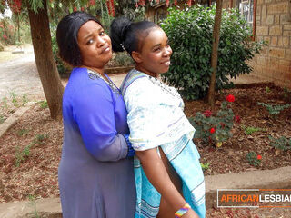 African cougar lesbos Make Out In Public During palace soiree