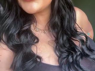 Lovely curly brown-haired solo cam onanism