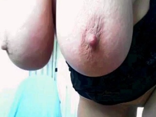 Buxom cougar Laura Orsolya's cam showcase